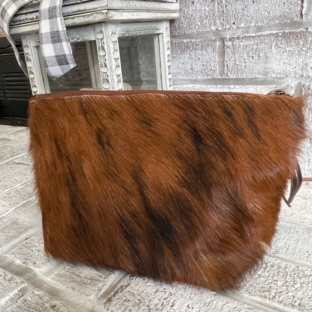 Cosmetic bag, new hair on hide, lined interior, zipper, inside pocket & tassel